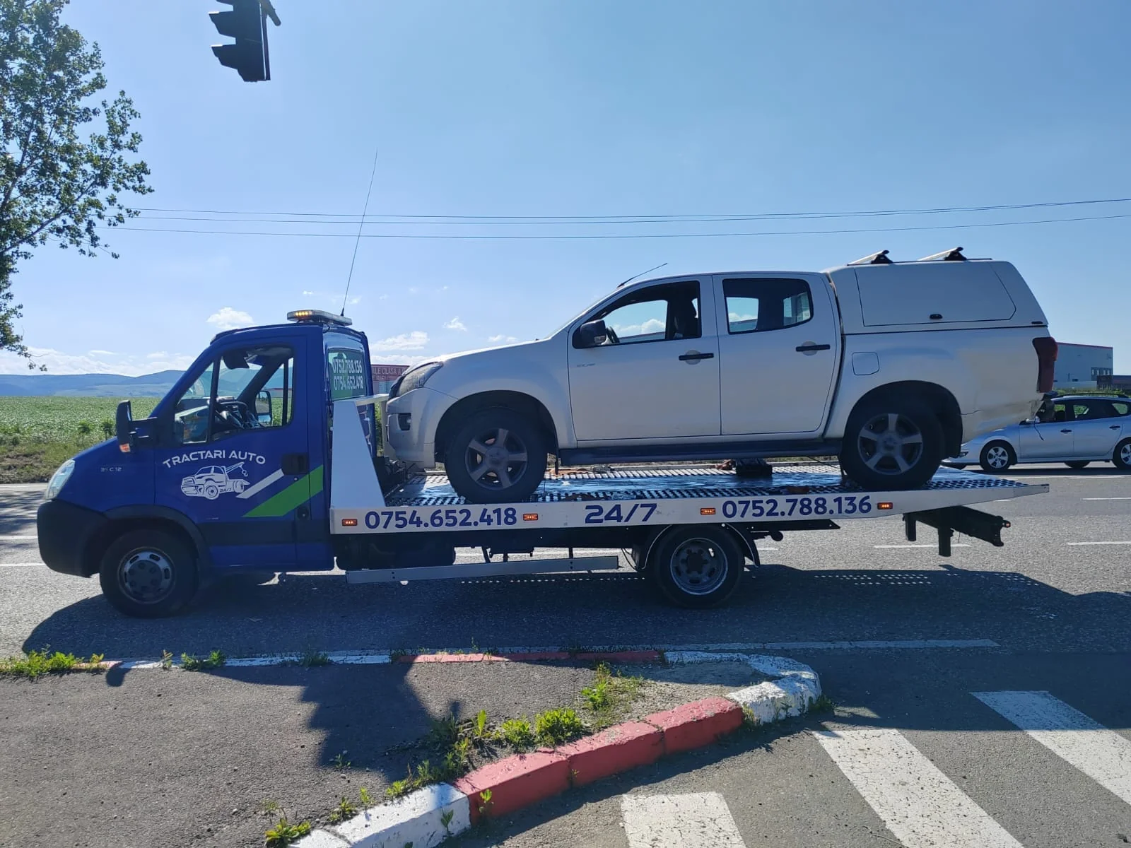 Tractari auto Bacau - asistenta rutiera si transport platforma